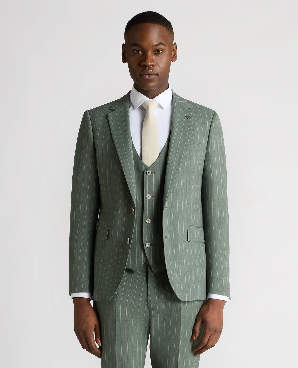 Man wearing a green Slim Fit Wool-Blend Mix and Match Suit Jacket