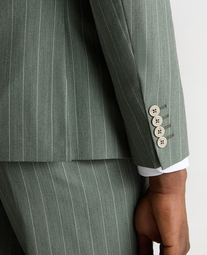 Man wearing a green Slim Fit Wool-Blend Mix and Match Suit Jacket