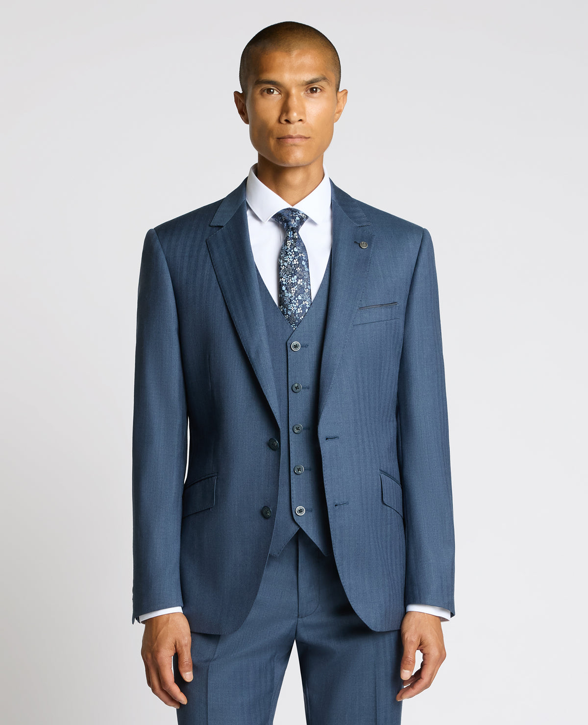 Man wearing a blue Tapered fit Wool Blend Suit