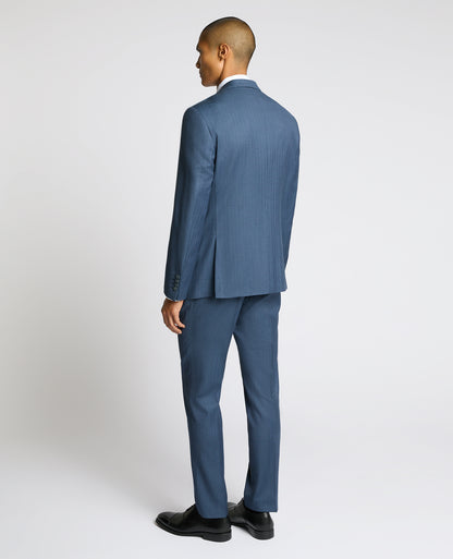 Man wearing a blue Tapered fit Wool Blend Suit