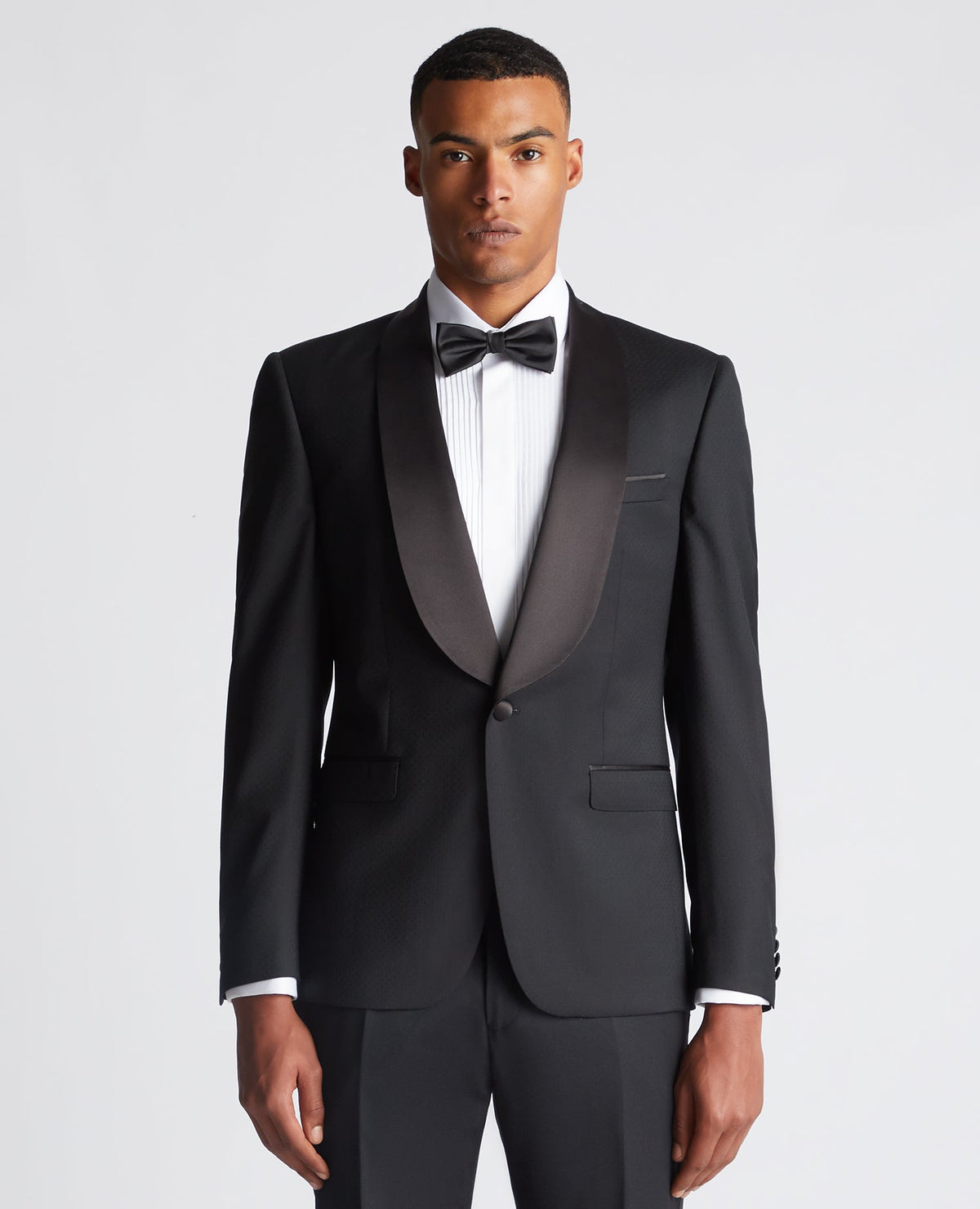 Man wearing a black Slim Fit Wool-Rich Mix and Match Suit