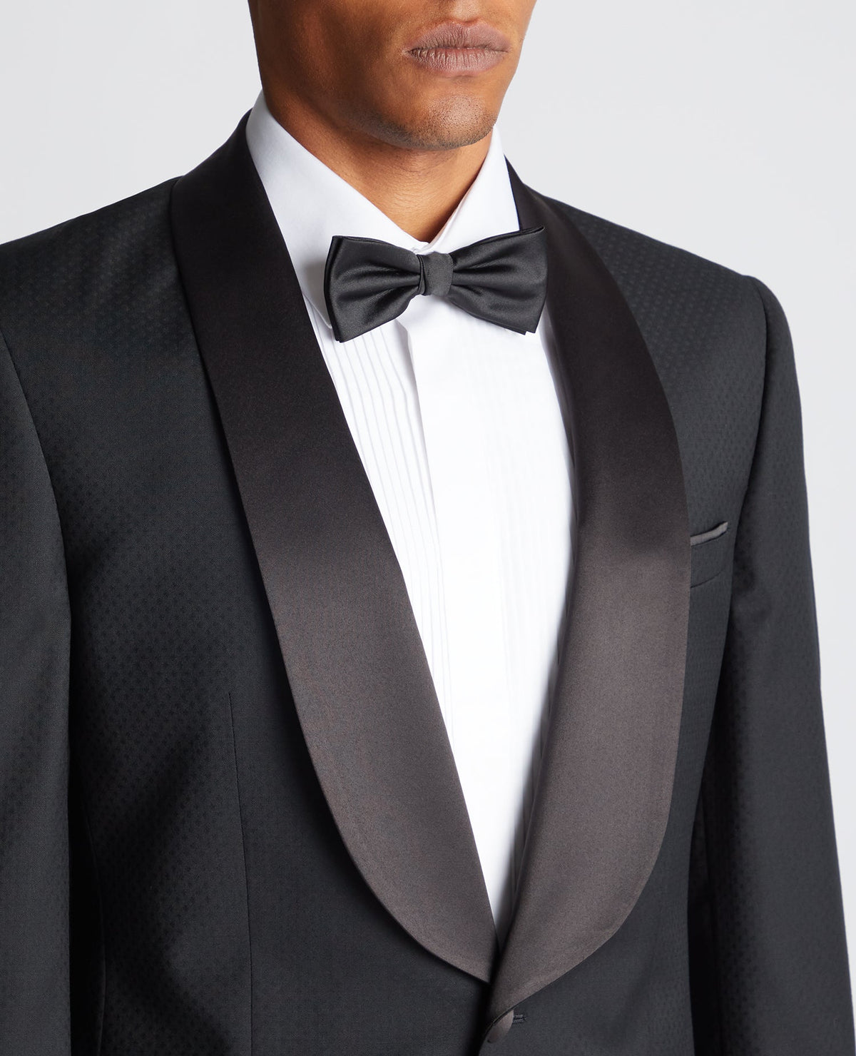 Man wearing a black Slim Fit Wool-Rich Mix and Match Suit