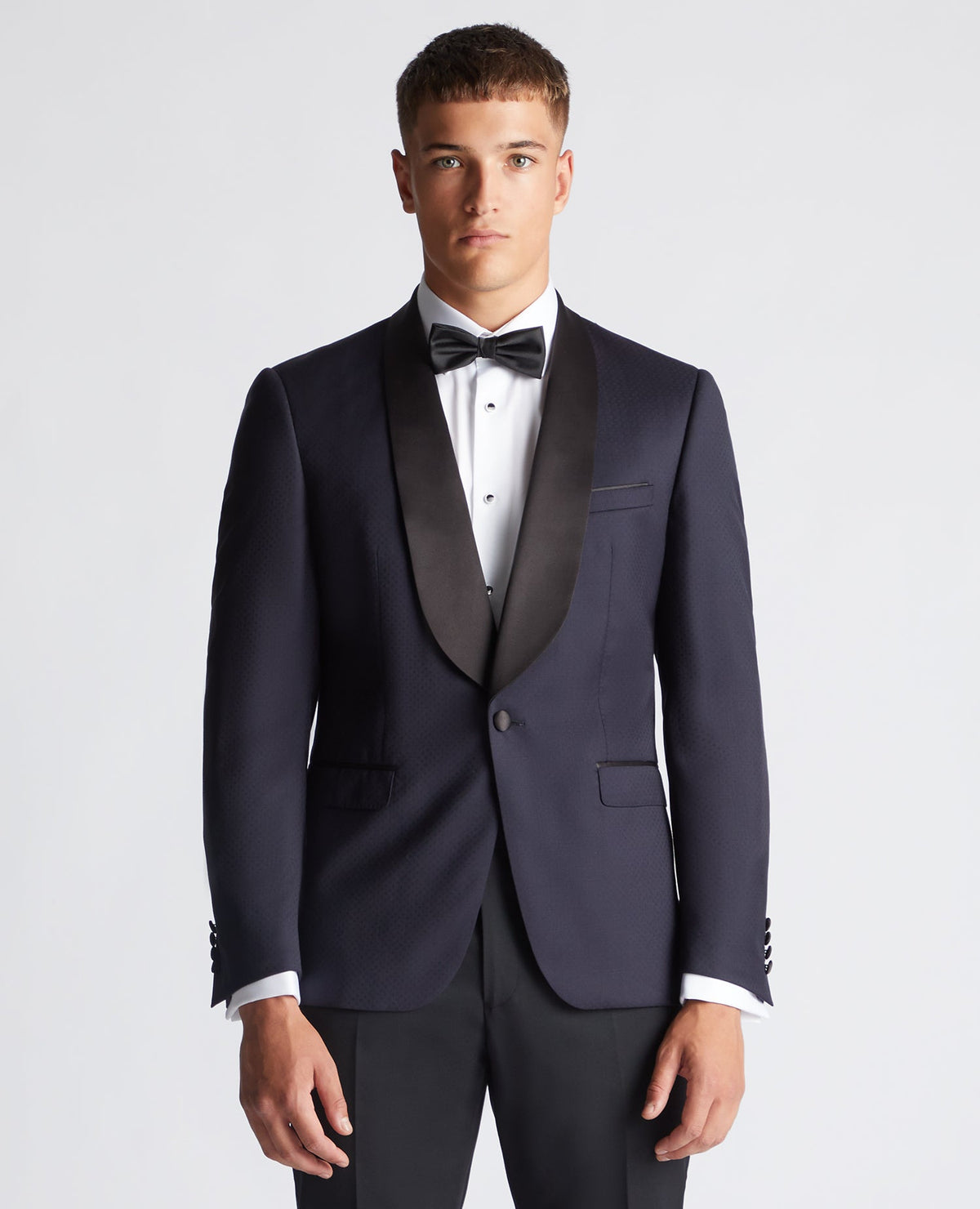 Man wearing a navy Slim Fit Wool-Rich Mix and Match Suit