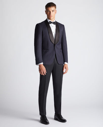 Man wearing a navy Slim Fit Wool-Rich Mix and Match Suit