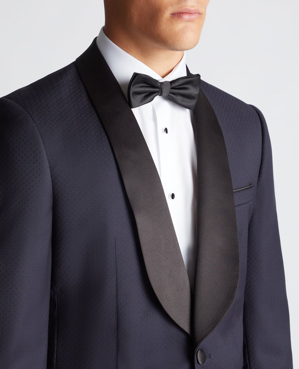 Man wearing a navy Slim Fit Wool-Rich Mix and Match Suit