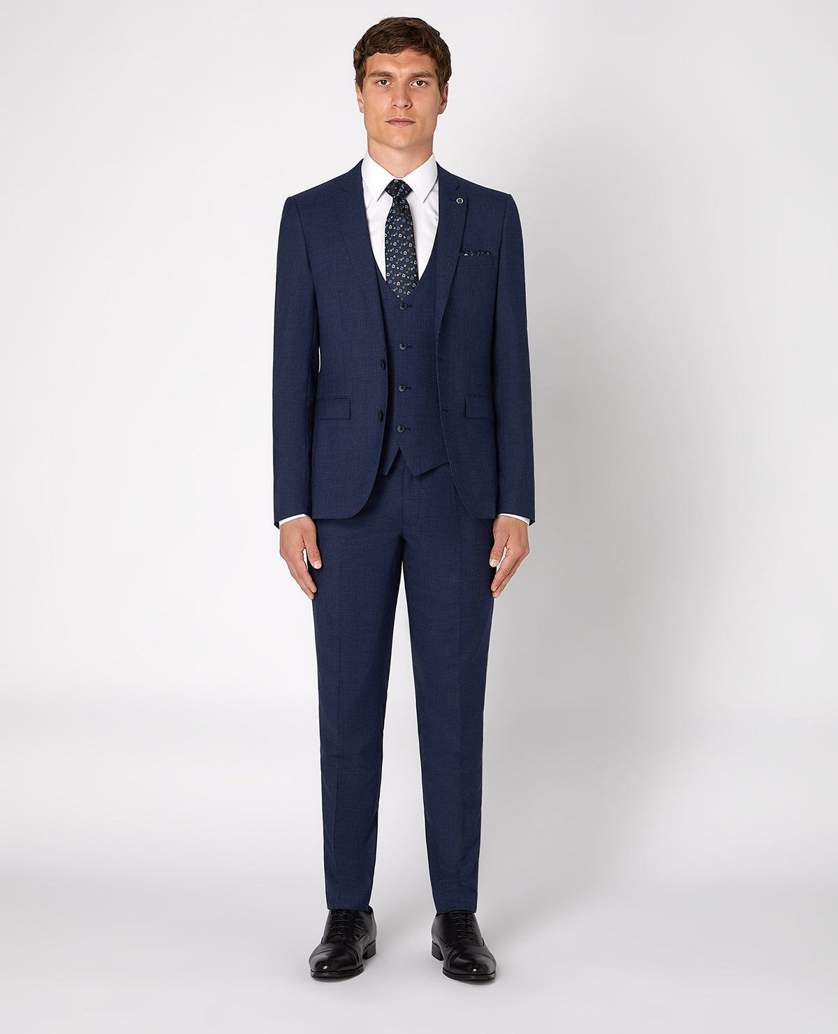 Man wearing a blue X-Slim Fit Wool Rich Mix and Match Suit Jacket
