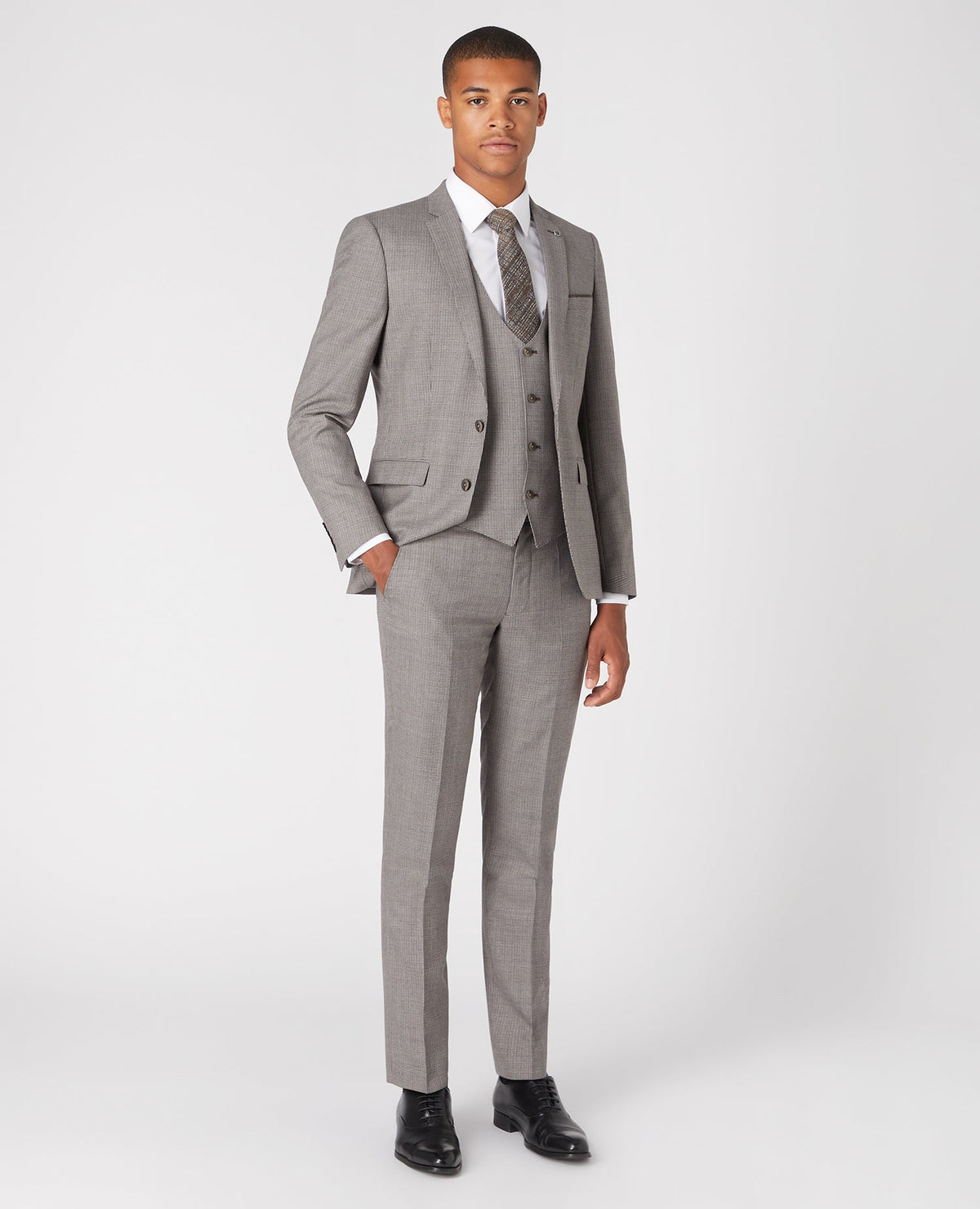 Man wearing a sand X-Slim Fit Wool Rich Mix and Match Suit