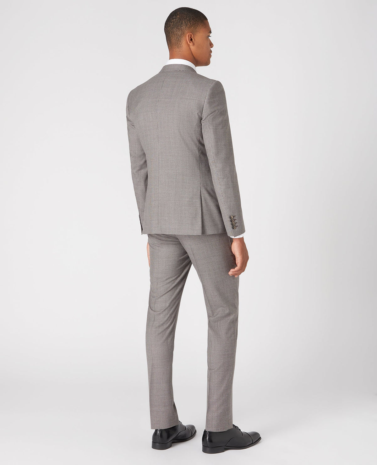 Man wearing a sand X-Slim Fit Wool Rich Mix and Match Suit
