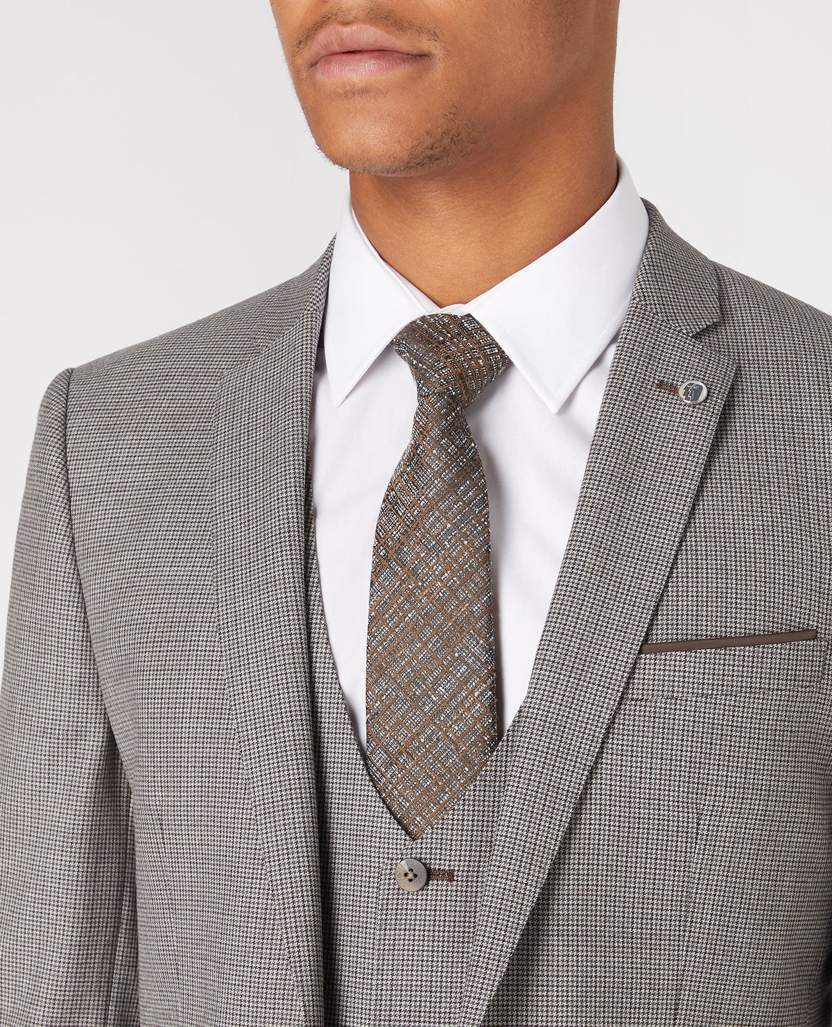 Man wearing a sand X-Slim Fit Wool Rich Mix and Match Suit