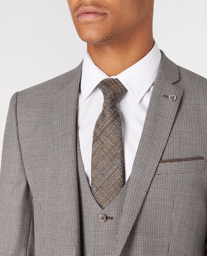Man wearing a sand X-Slim Fit Wool Rich Mix and Match Suit
