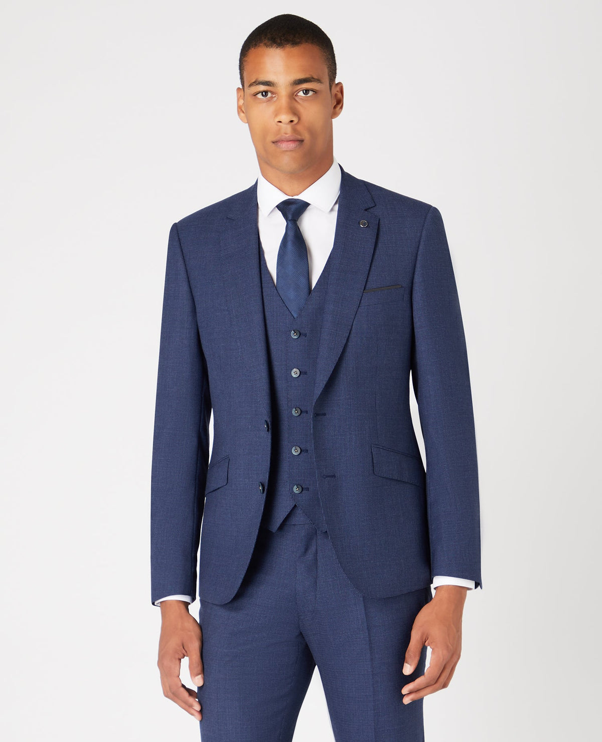 Man wearing a blue Tapered Fit Wool Blend Mix and Match Suit