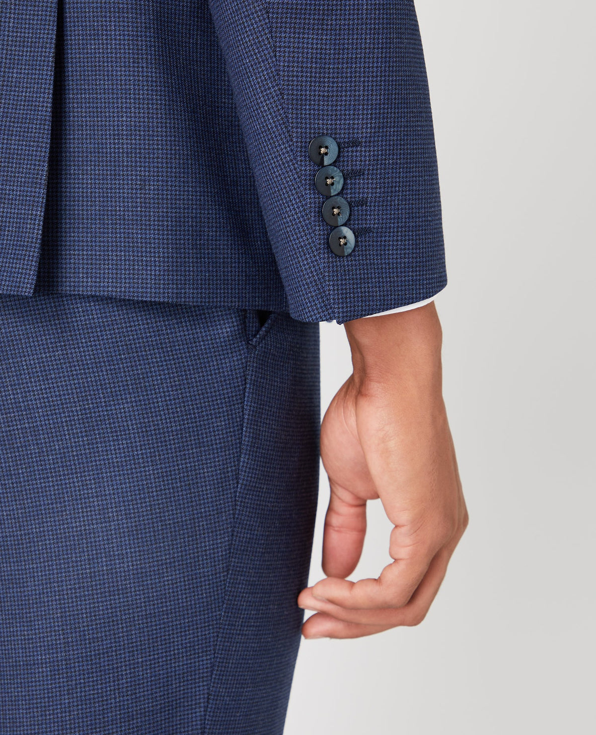 Man wearing a blue Tapered Fit Wool Blend Mix and Match Suit