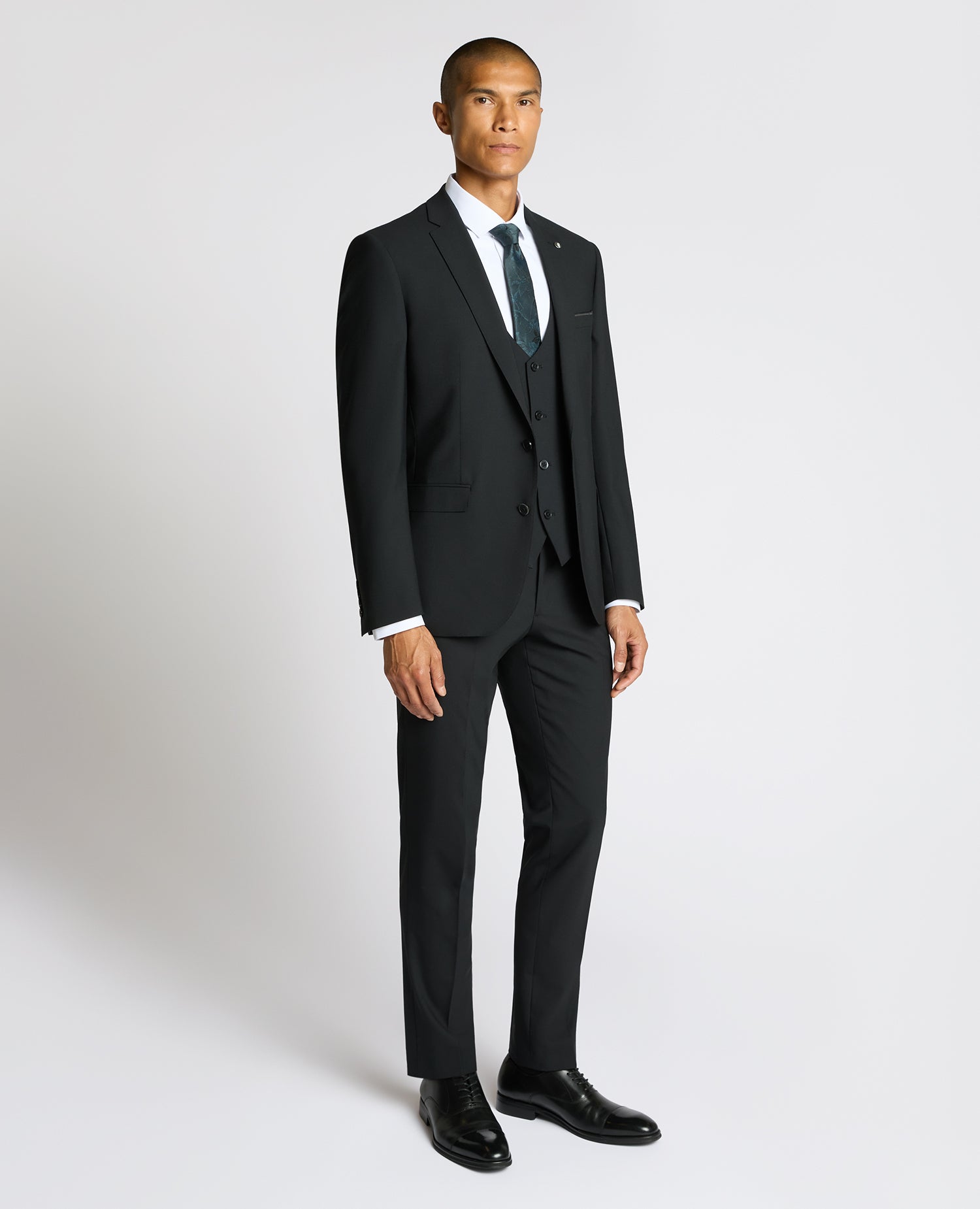 Man wearing a black Slim Fit Wool-Blend Suit