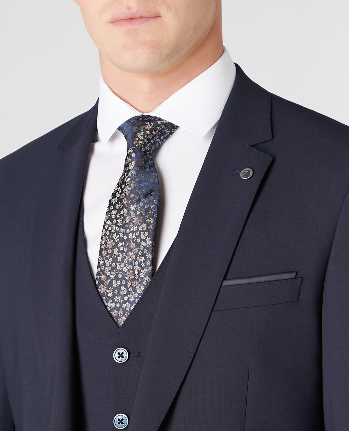 Man wearing a navy Tapered fit wool blend stretch mix and match suit jacket