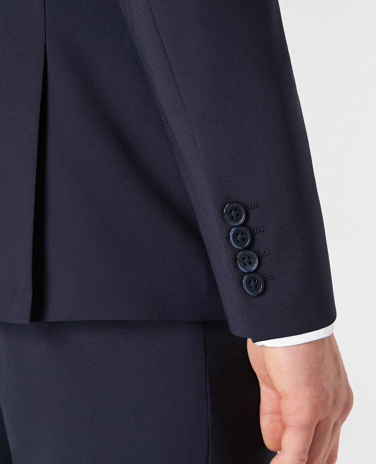 Man wearing a navy Tapered fit wool blend stretch mix and match suit jacket