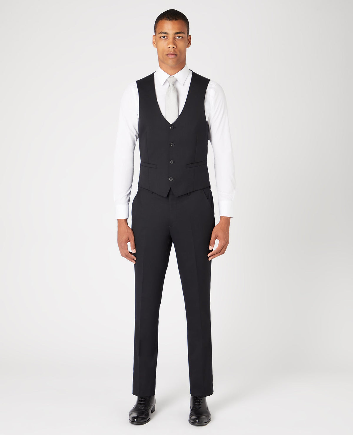 Man wearing a black Slim Fit Wool-Blend Stretch Mix and Match Waistcoat