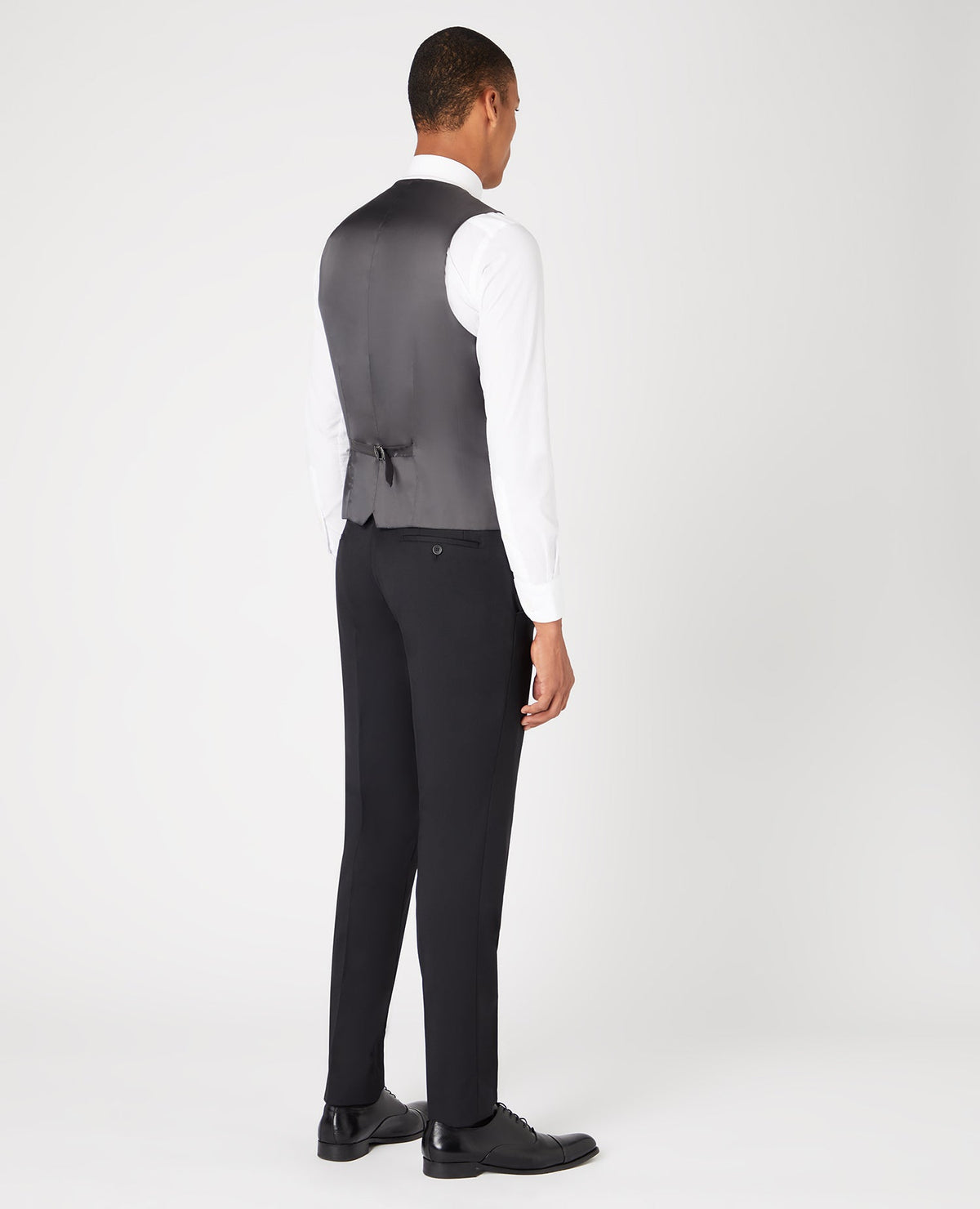 Man wearing a black Slim Fit Wool-Blend Stretch Mix and Match Waistcoat