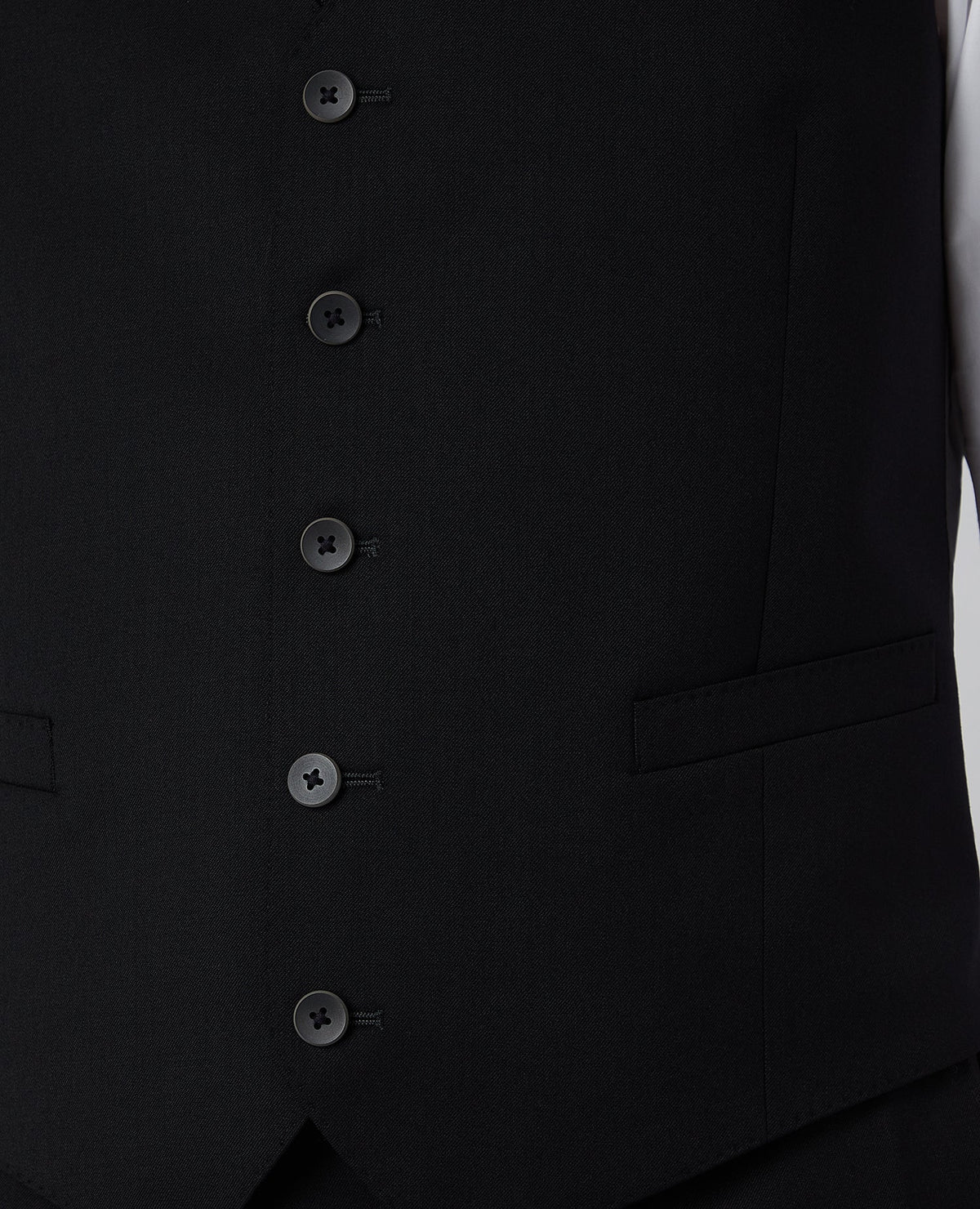 Man wearing a black Tapered Fit Wool-Blend Stretch Mix and Match Suit Waistcoat