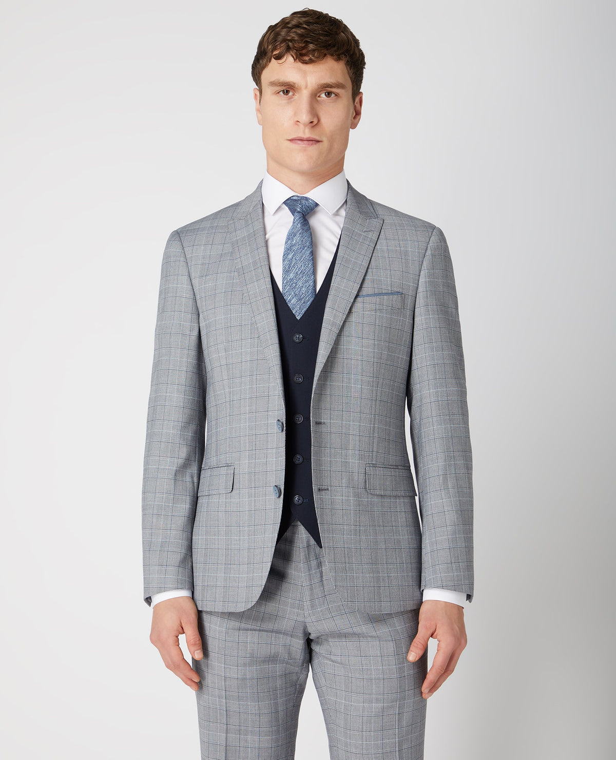 Man wearing a navy Tapered Fit Stretch Waistcoat