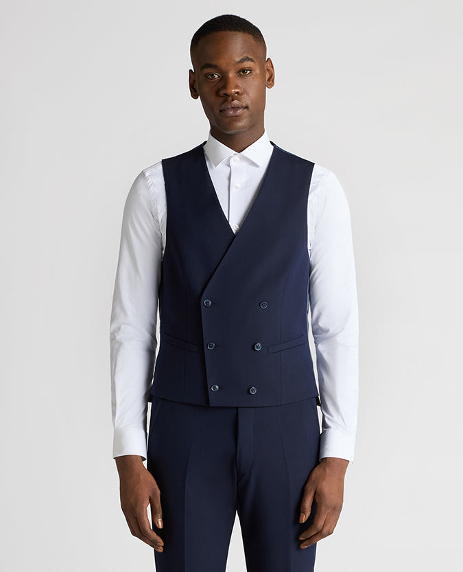 Man wearing a navy suit