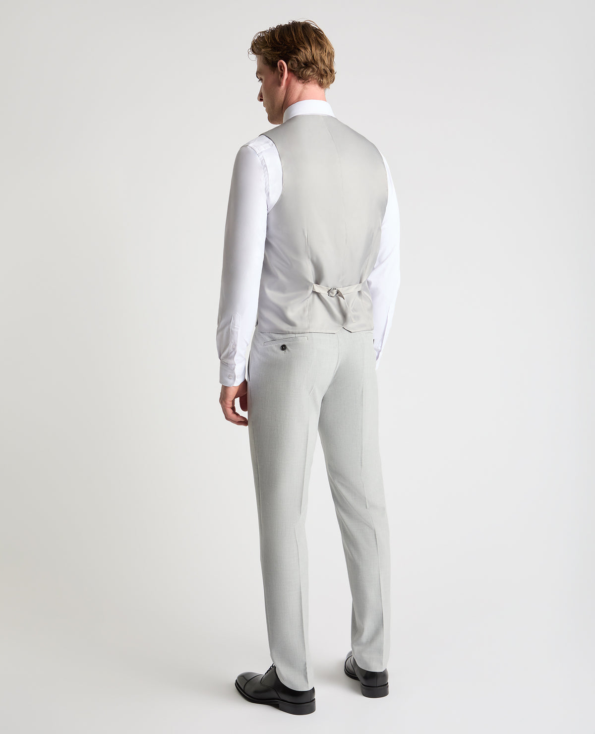 Man wearing a Grey suit