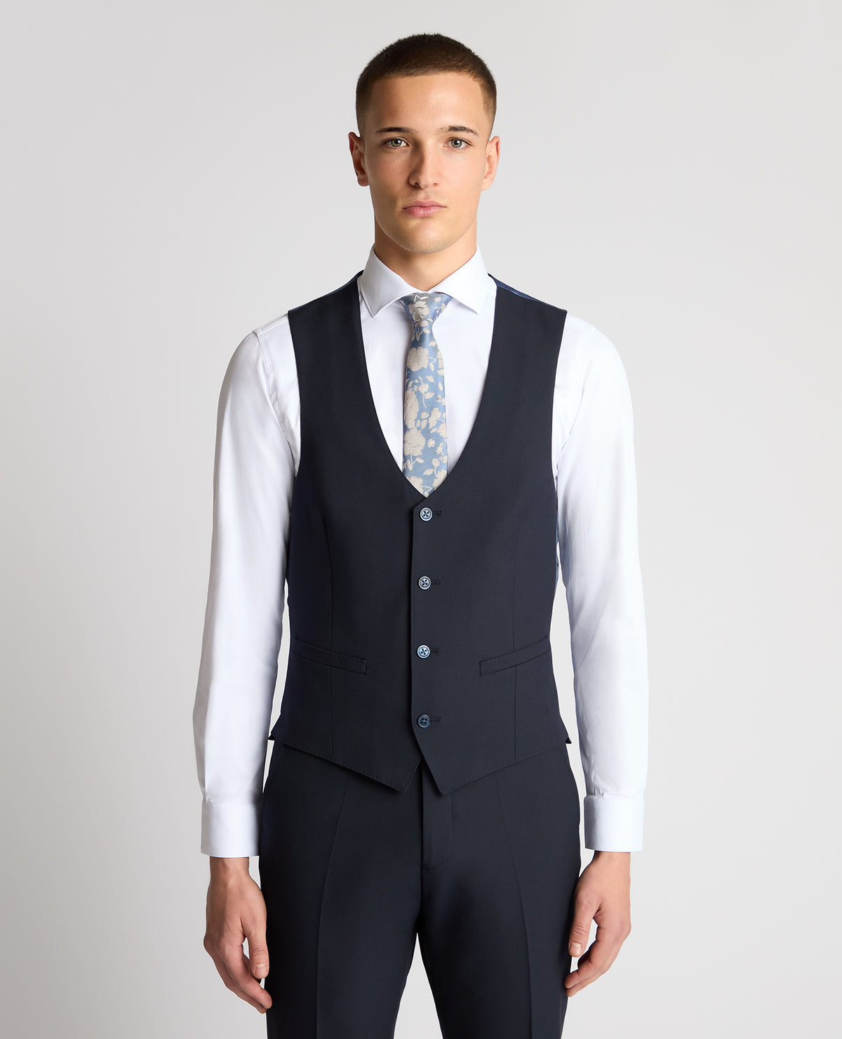 Man wearing a navy suit