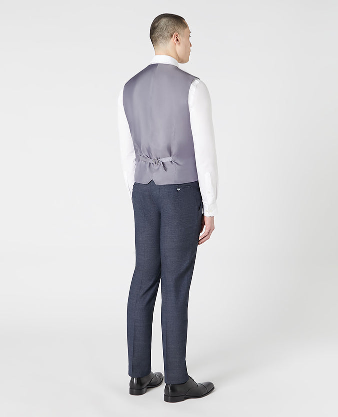 Man wearing a blue Tapered Fit Wool-Rich Mix and Match Suit Waistcoat