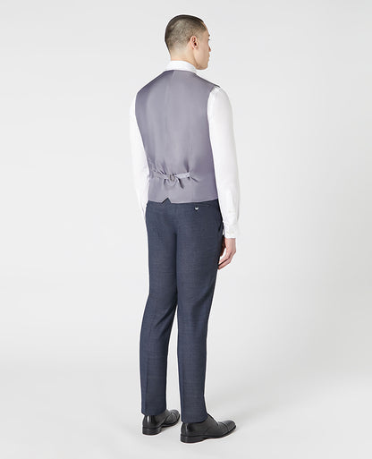 Man wearing a blue Tapered Fit Wool-Rich Mix and Match Suit Waistcoat