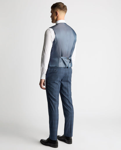 Man wearing a blue Tapered Fit Checked Wool Bend Waistcoat