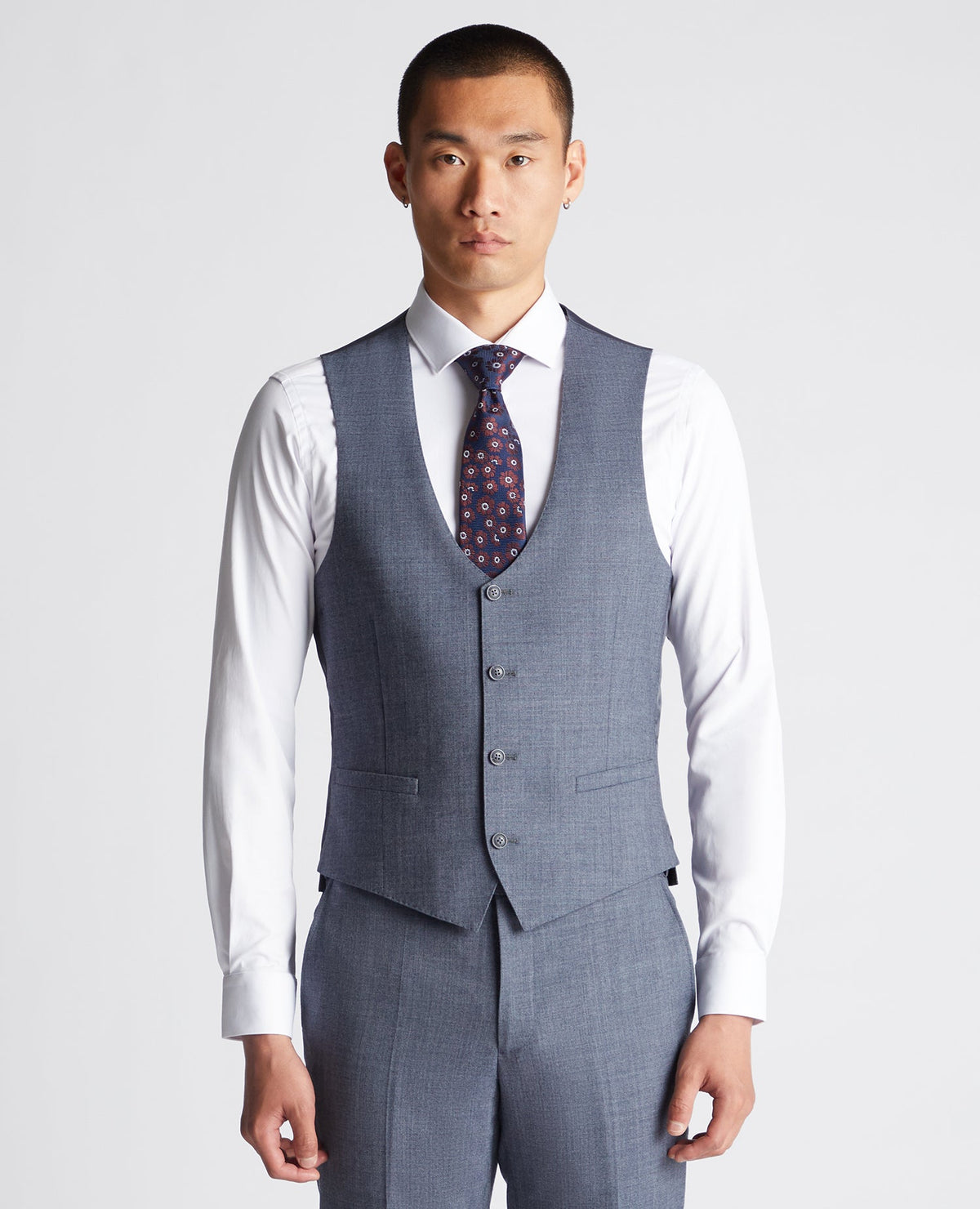 Man wearing a blue X-Slim Fit Wool Blend Mix And Match Suit Waistcoat