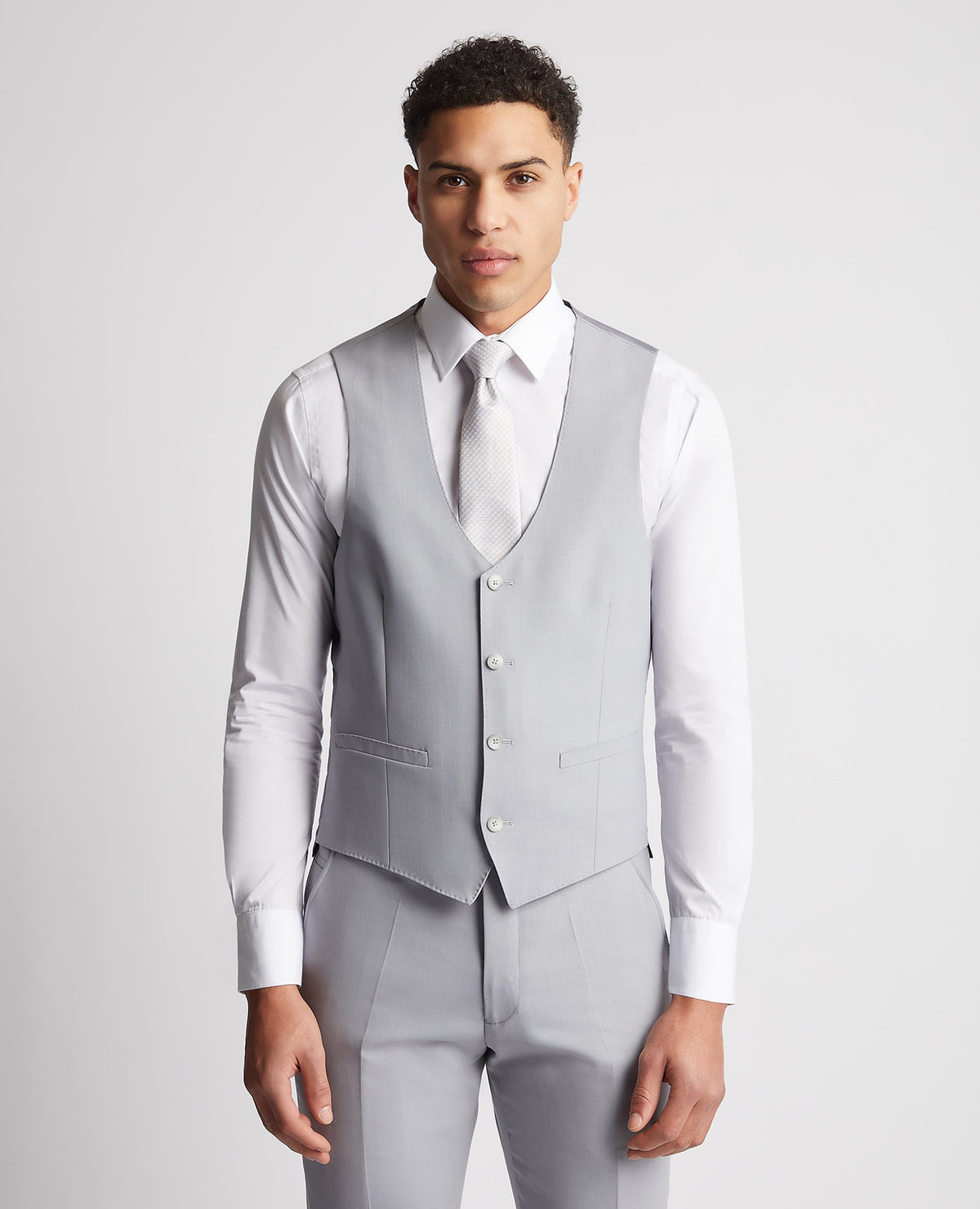 Man wearing a blue Slim Fit Wool Rich Mix and Match Waistcoat