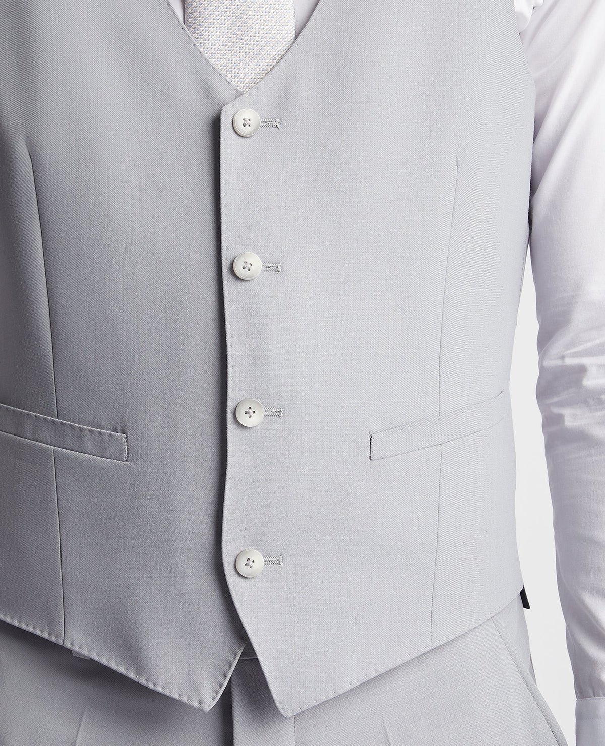 Man wearing a blue Slim Fit Wool Rich Mix and Match Waistcoat