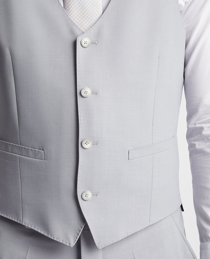 Man wearing a blue Slim Fit Wool Rich Mix and Match Waistcoat