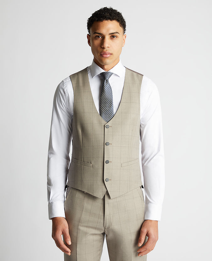 Man wearing a sand Slim Fit Wool Rich Mix and Match Suit Waistcoat