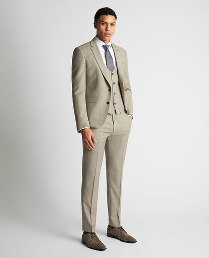 Man wearing a sand Slim Fit Wool Rich Mix and Match Suit Waistcoat