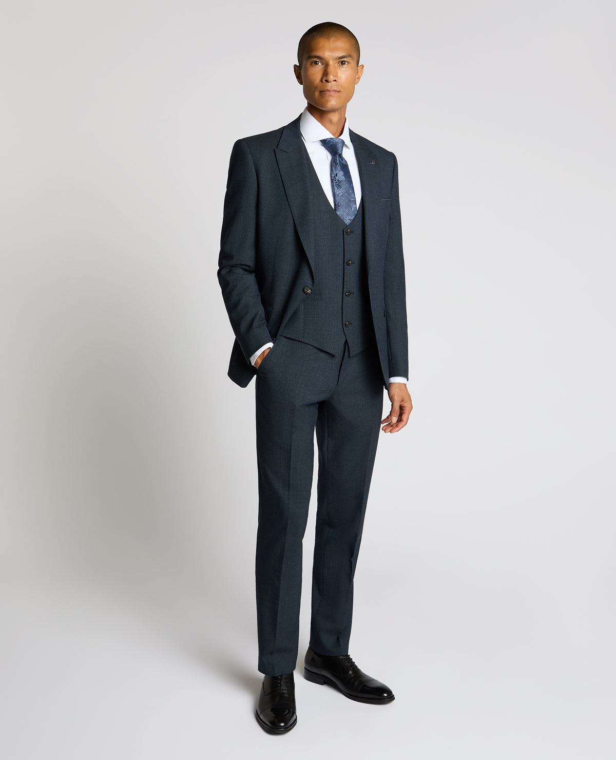 Man wearing a blue Wool Blend Waistcoat