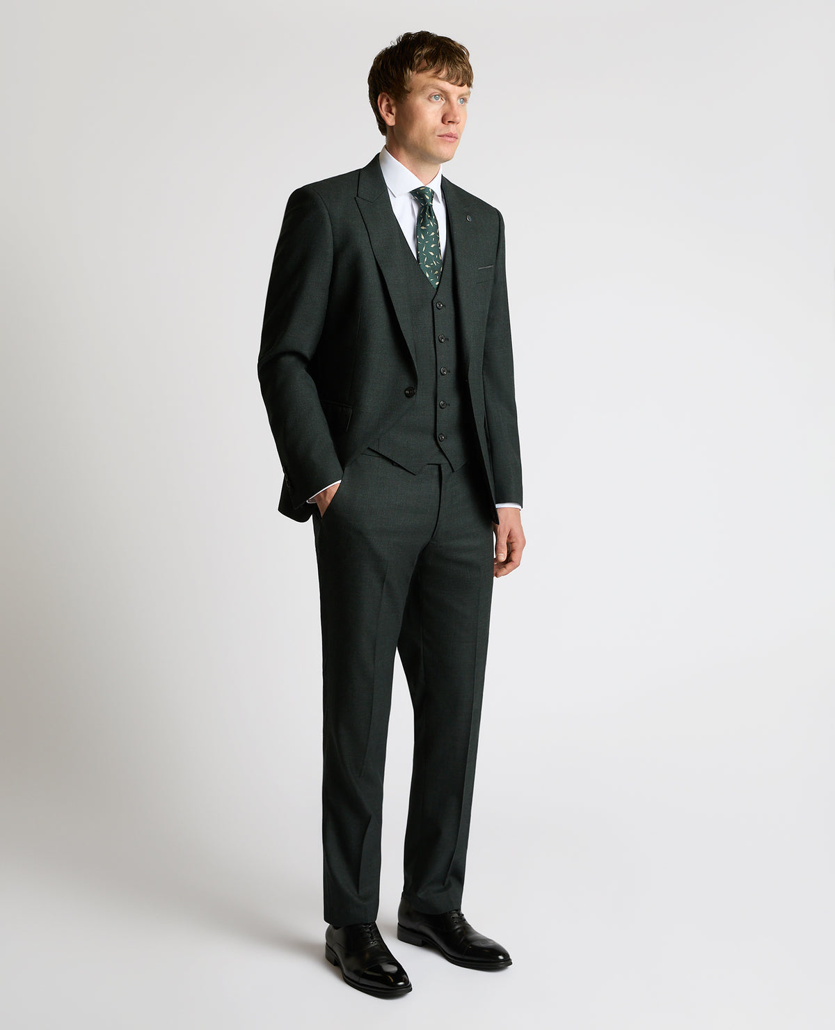 Man wearing a green Wool Stretch Waistcoat