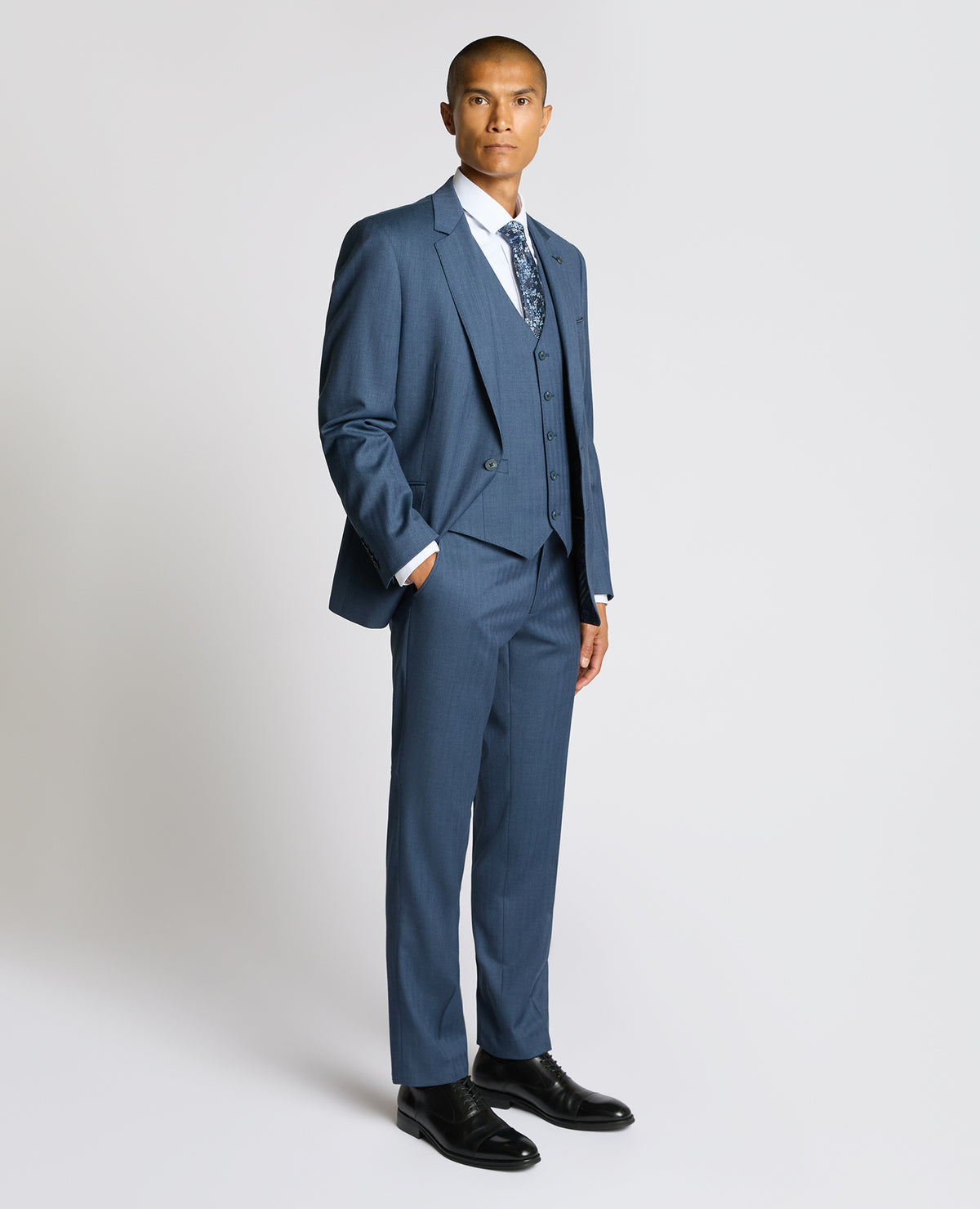 Man wearing a blue Mix and match suit waistcoat