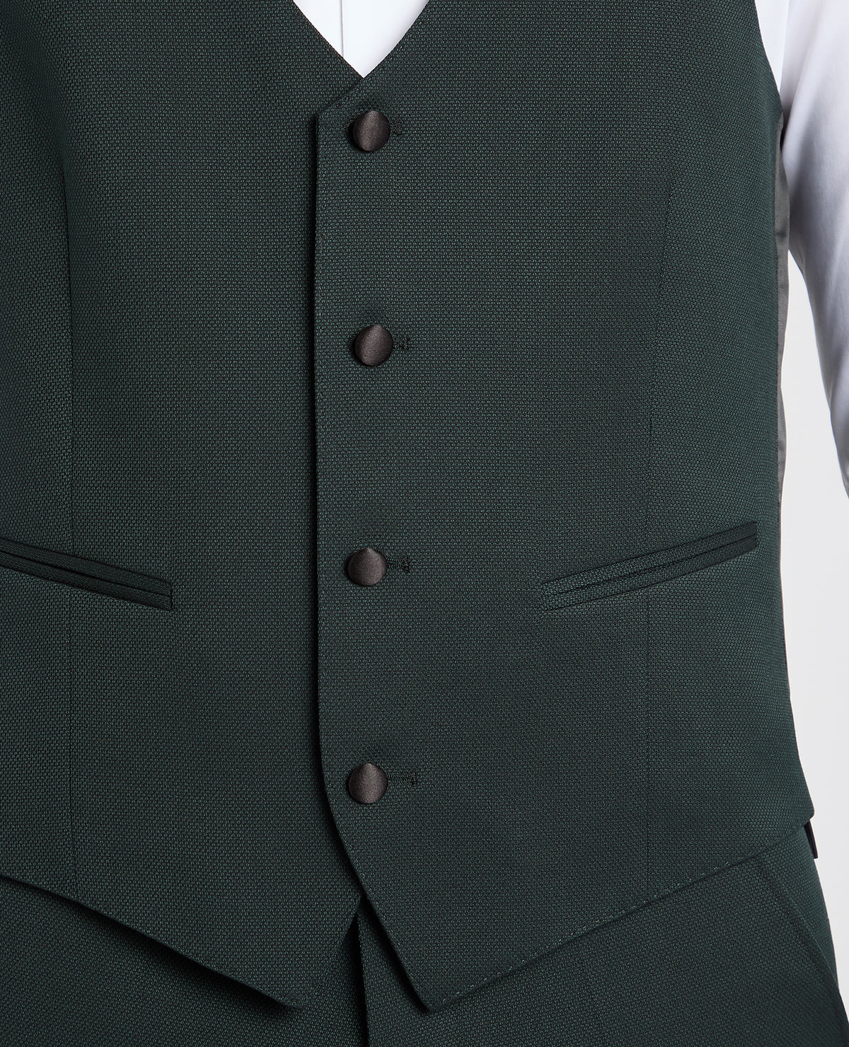 Man wearing a green suit