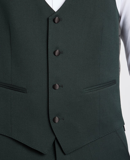 Man wearing a green suit