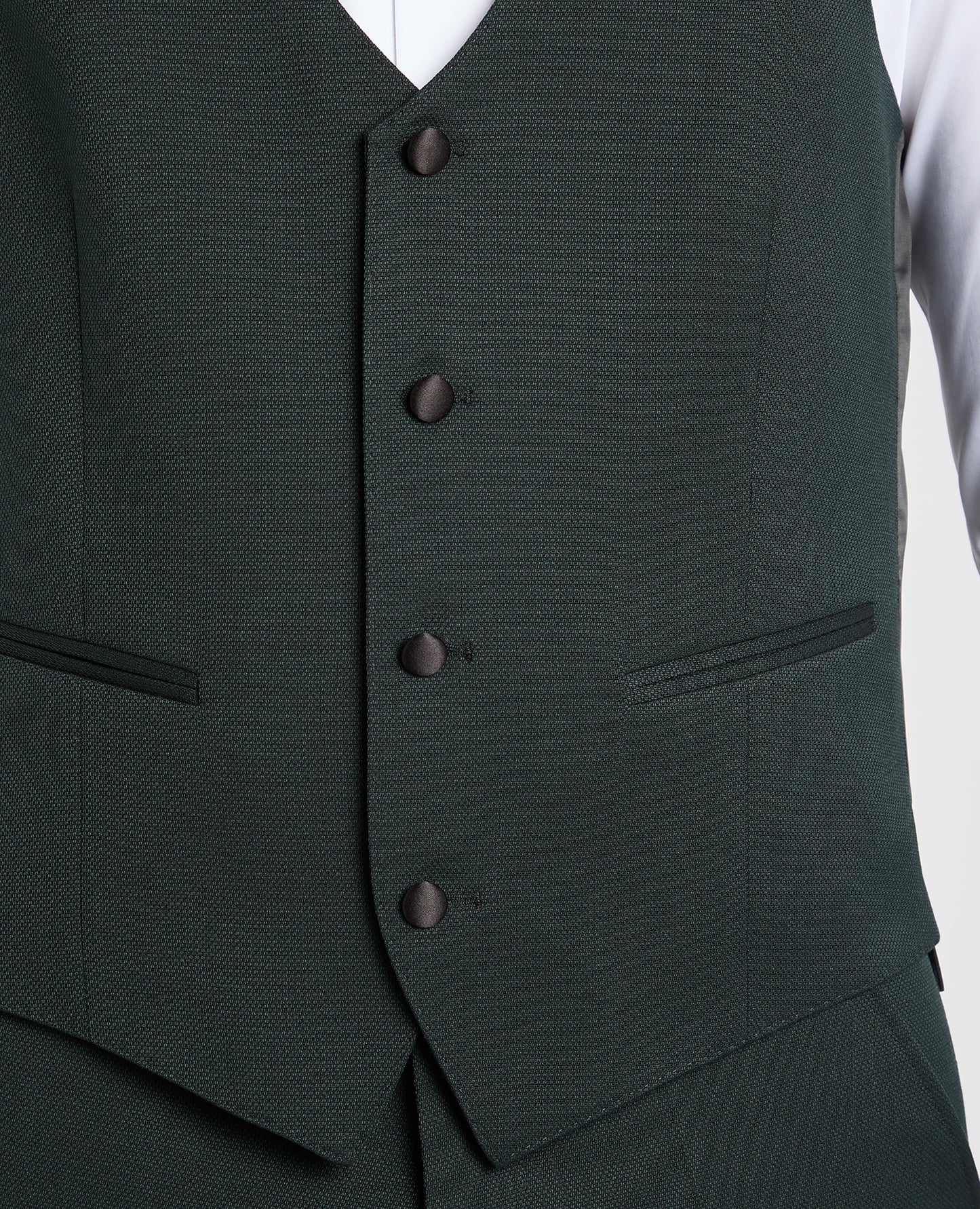 Man wearing a green suit