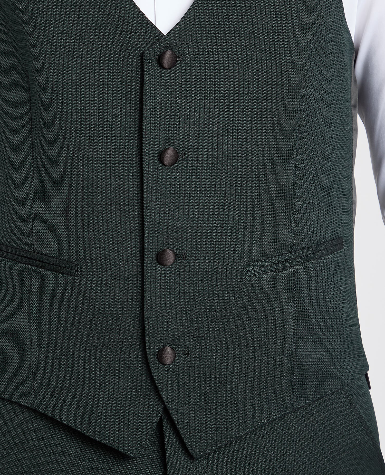 Man wearing a green suit