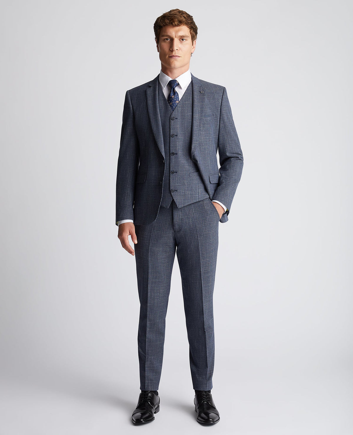 Man wearing a blue Slim Fit Checked Stretch Waistcoat