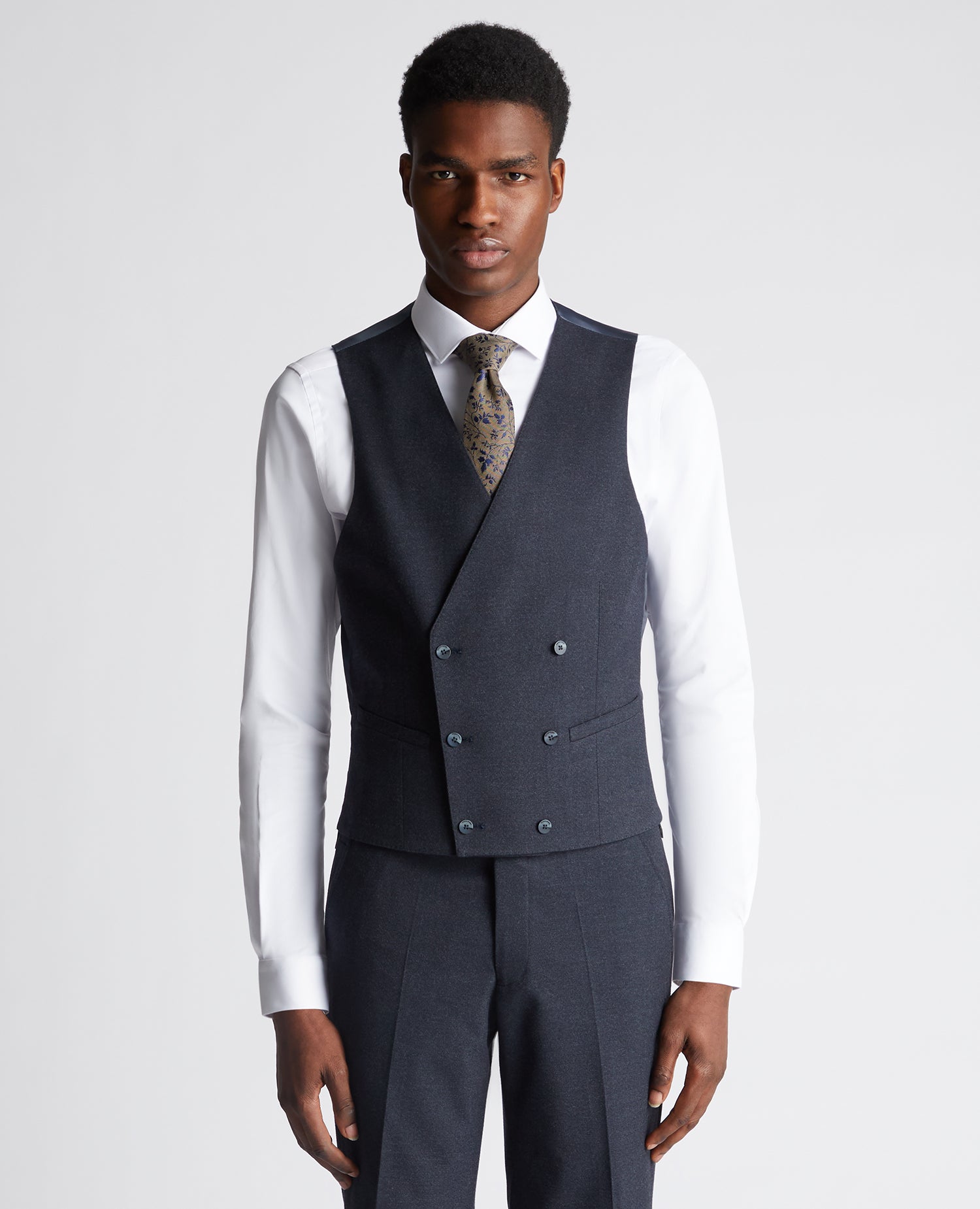 Man wearing a navy suit
