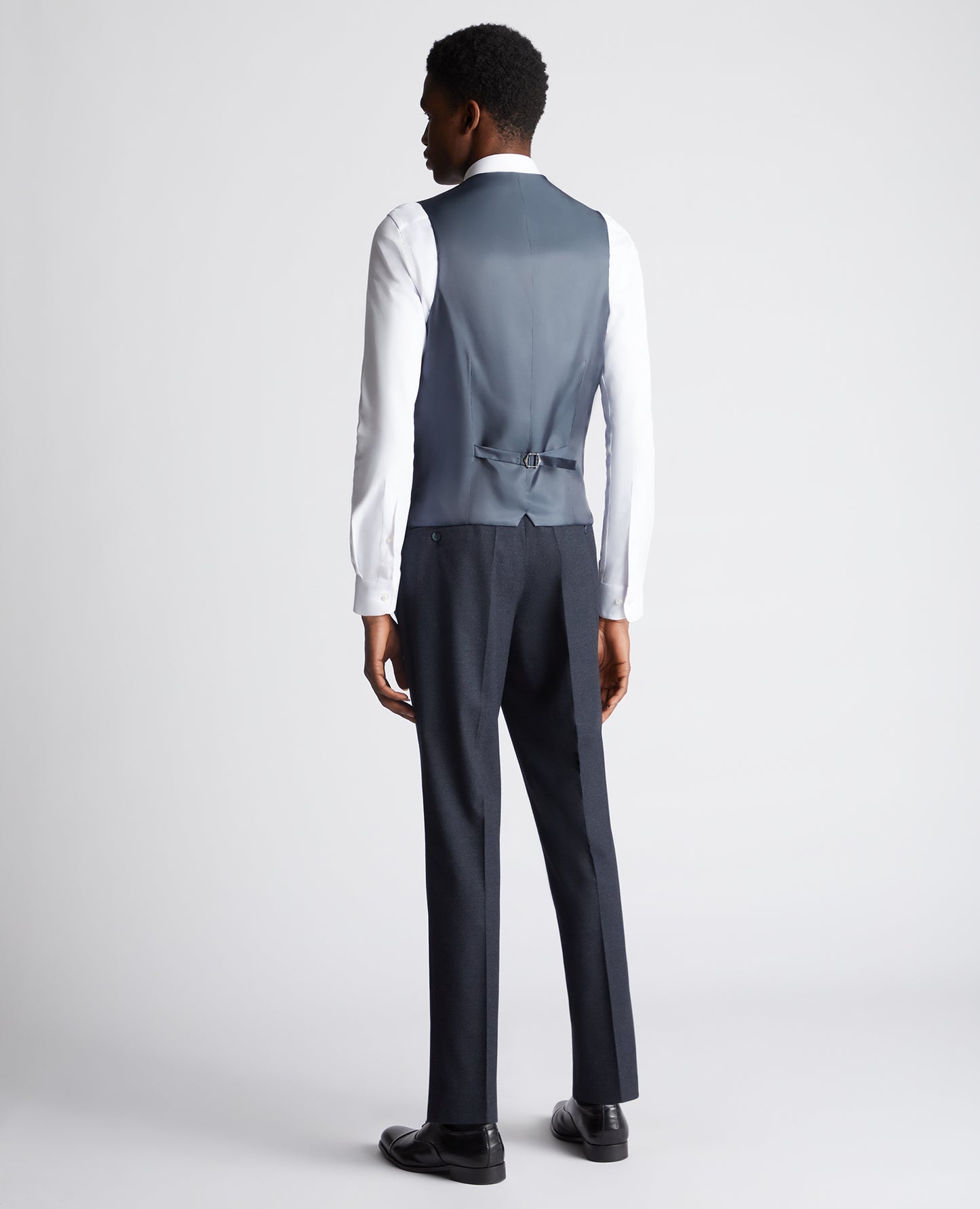 Man wearing a navy suit