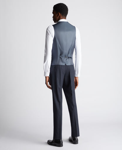 Man wearing a navy suit