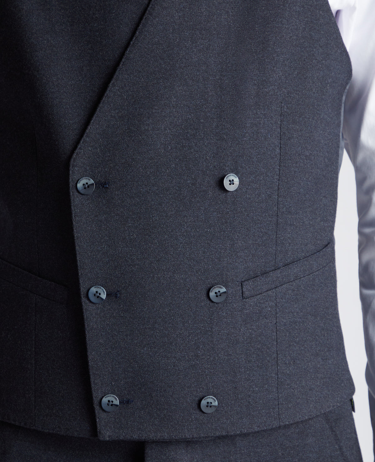 Man wearing a navy suit
