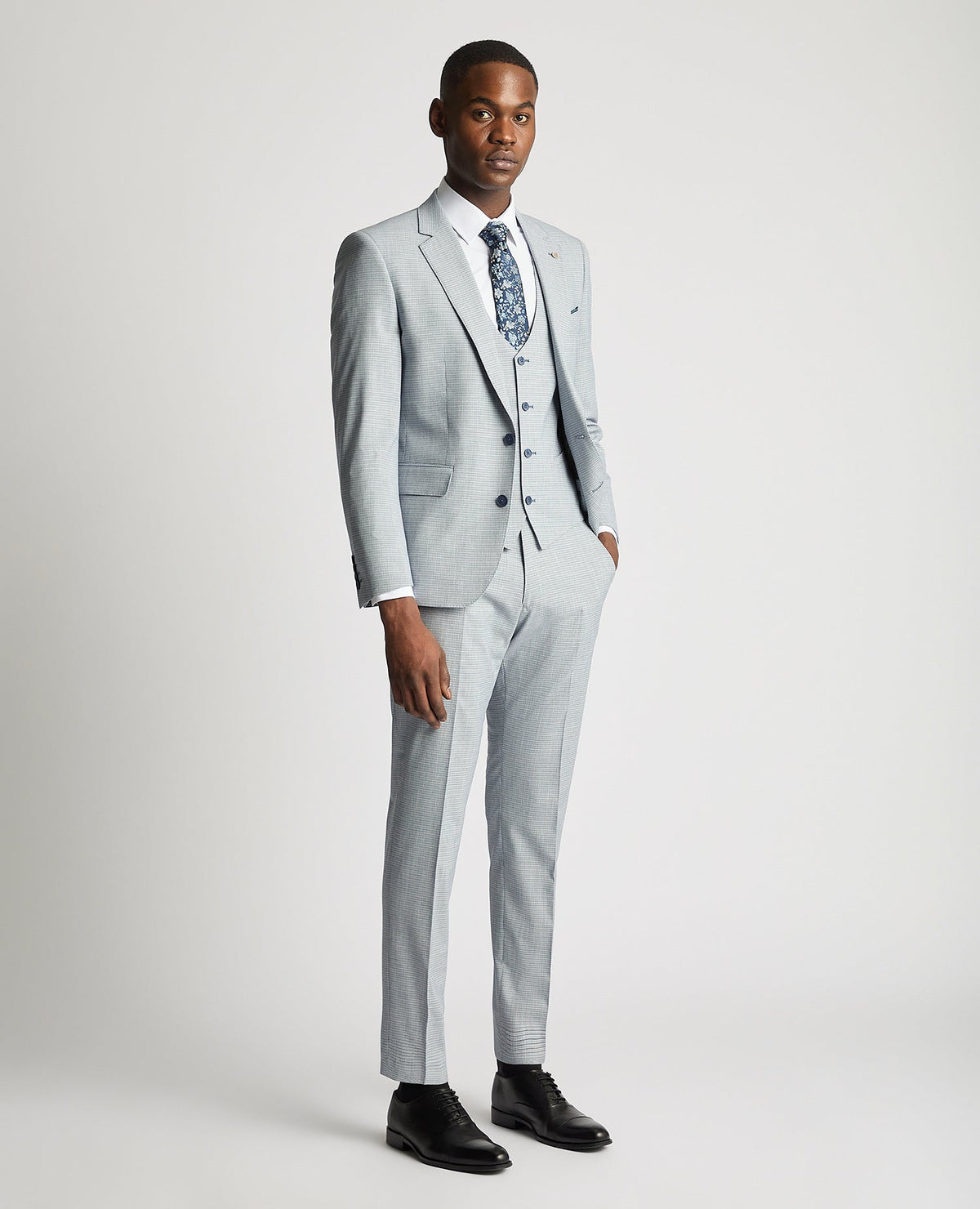 Man wearing a blue Slim Fit Stretch Waistcoat