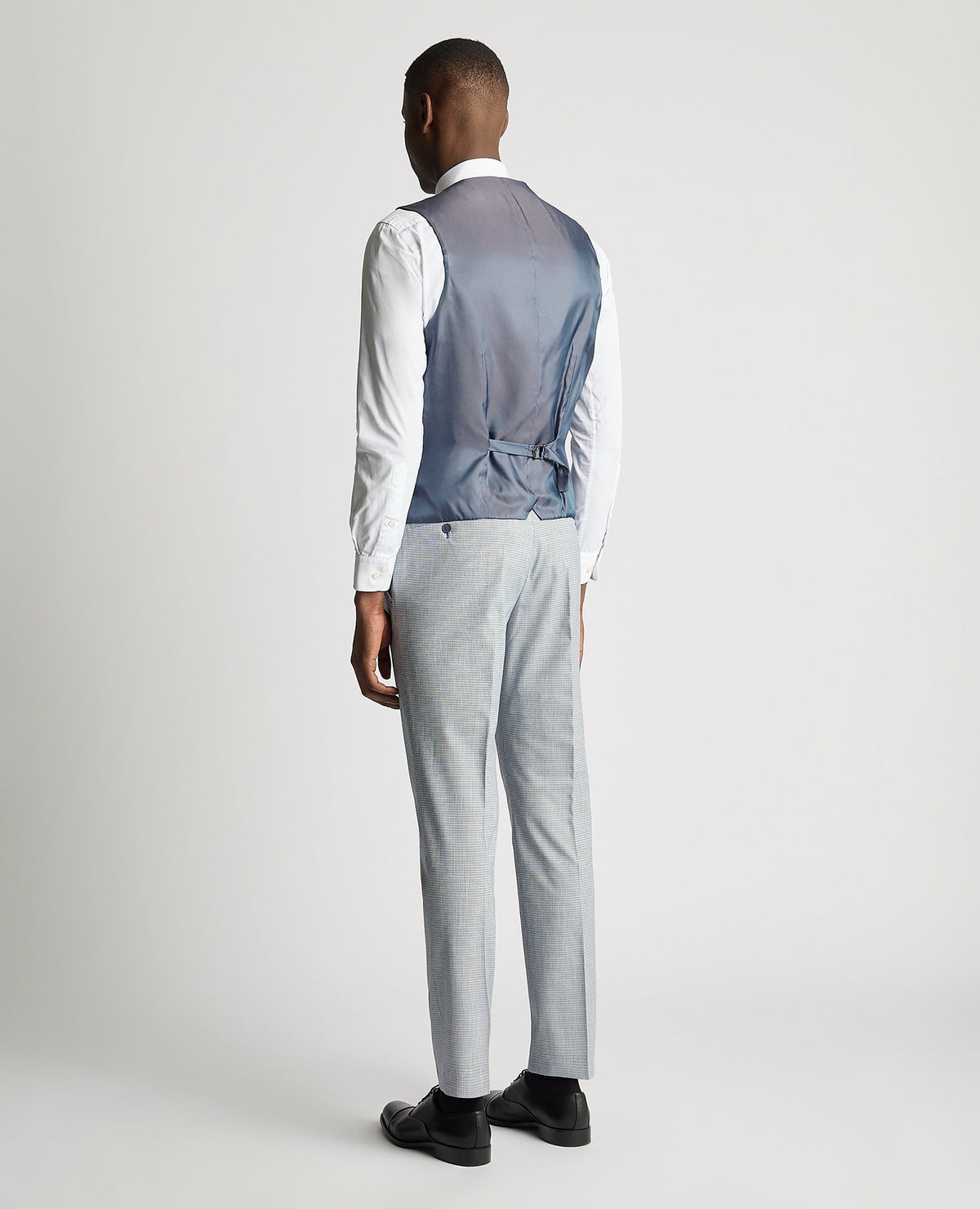 Man wearing a blue Slim Fit Stretch Waistcoat