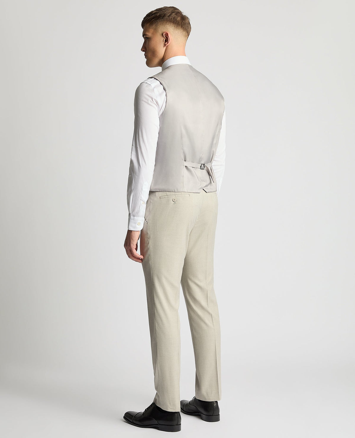 Man wearing a sand Tapered Fit Waistcoat